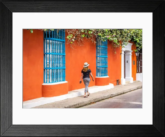 Framed Print : Colombia, Cartagena, typical street scene, woman walking Framed Print : Colombia, Cartagena, typical street scene, woman walking