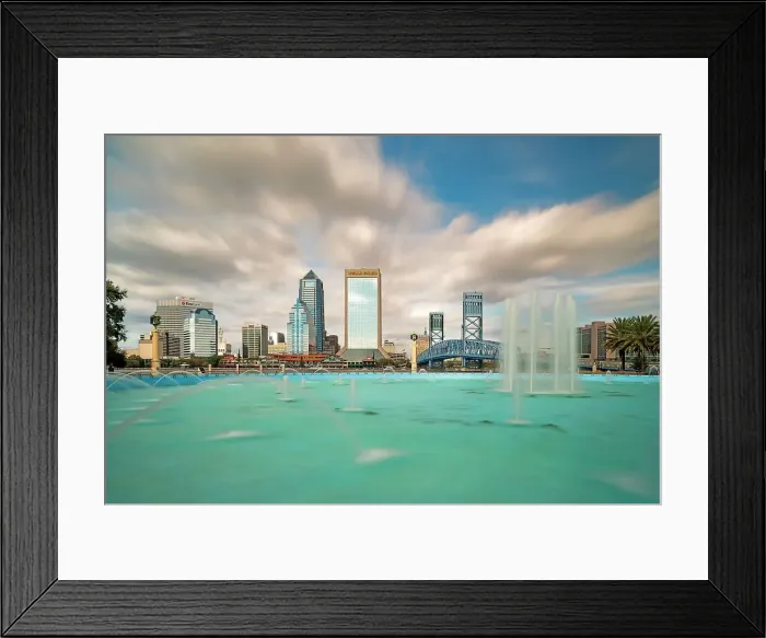 Framed Print : Florida, Downtown Jacksonville, city skyline with bridge and water fountain Framed Print : Florida, Downtown Jacksonville, city skyline with bridge and water fountain