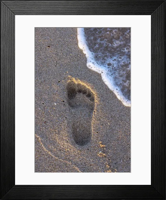Framed Print : Footprint on sand with wave Framed Print : Footprint on sand with wave
