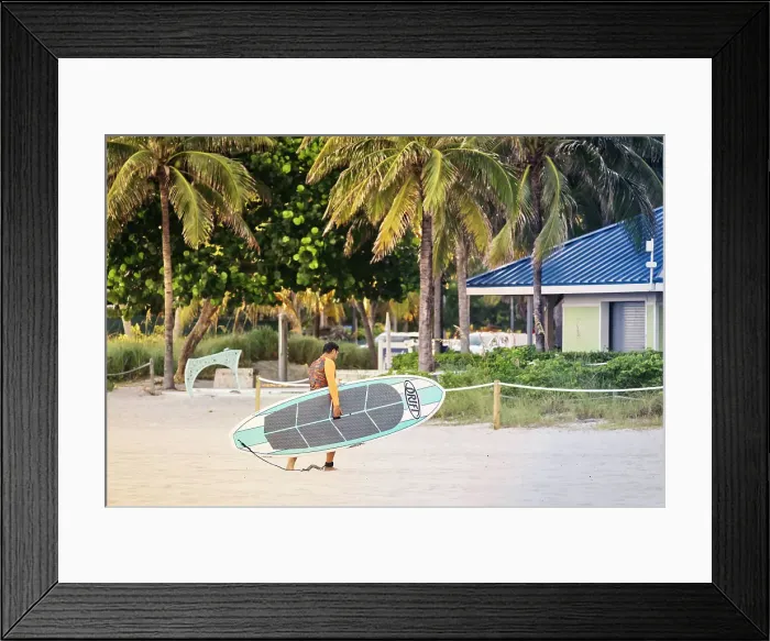 Framed Print : Florida, South Florida, Pompano Beach, man walking with surfboard