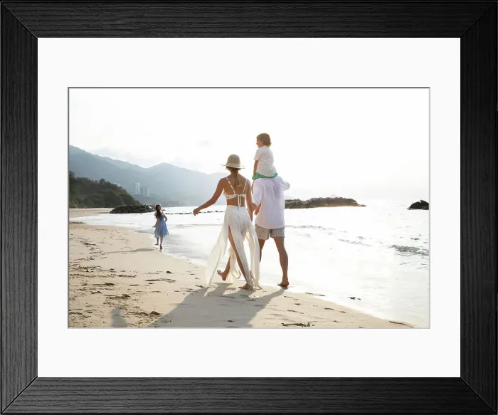 Framed Print : Mexico, Couple with children strolling along beach surf Framed Print : Mexico, Couple with children strolling along beach surf