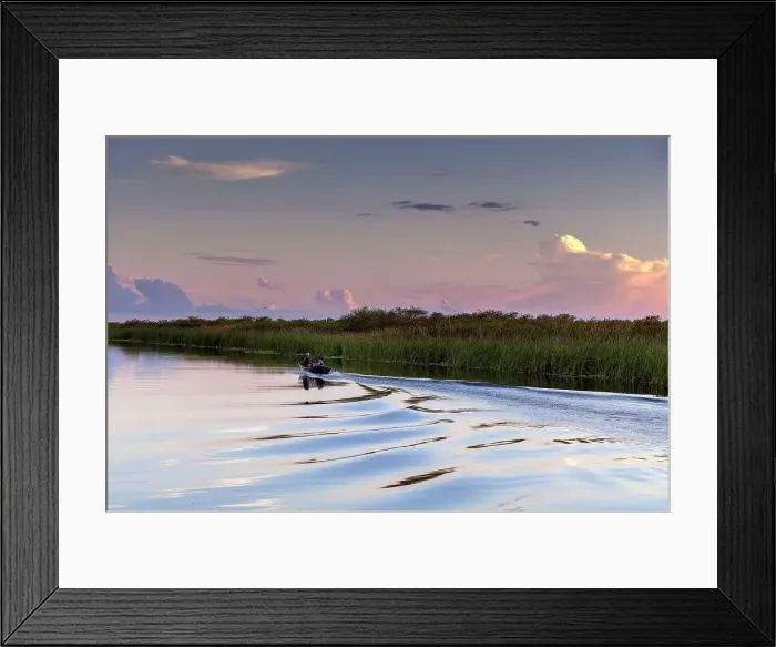 Framed Print : Family of three on small motor boat Framed Print : Family of three on small motor boat