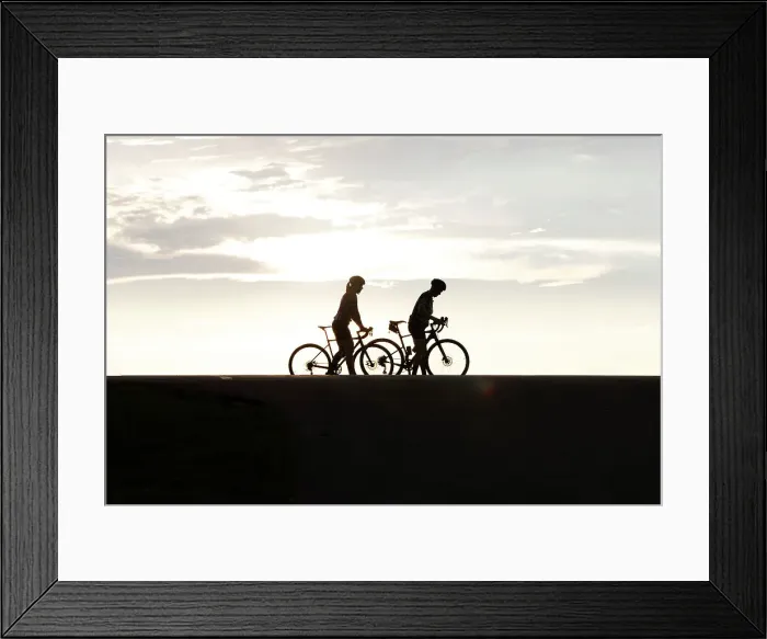 Framed Print : Silhouette of two female cyclists Framed Print : Silhouette of two female cyclists