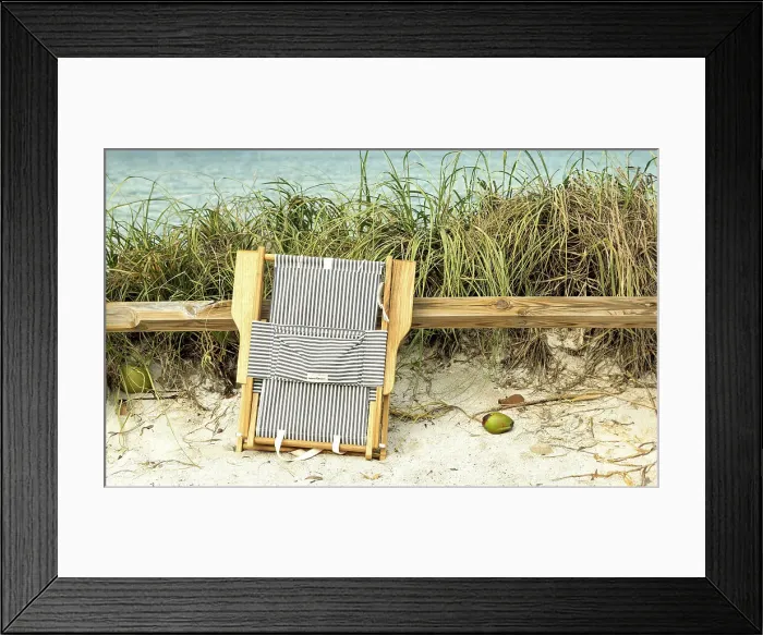 Framed Print : Folded beach chair