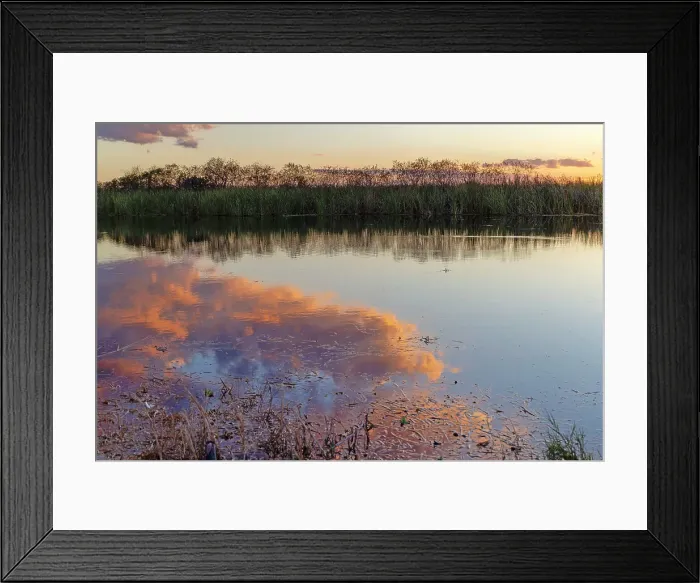 Framed Print : Clouds reflecting over water at sunset Framed Print : Clouds reflecting over water at sunset