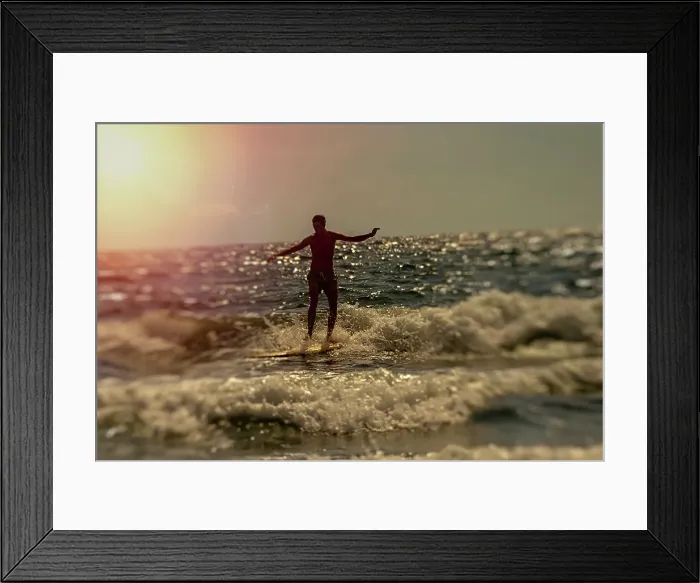 Framed Print : Male surfer riding a wave Framed Print : Male surfer riding a wave