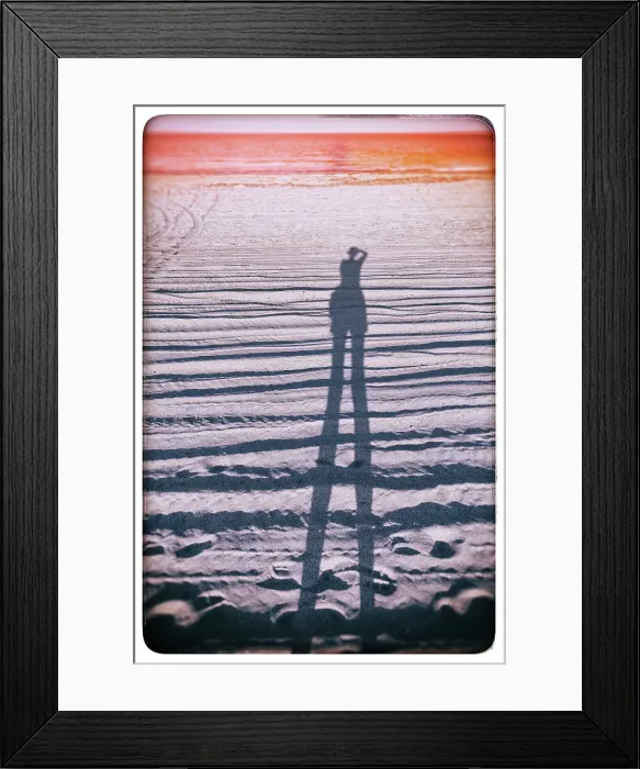 Framed Print : Abstract of figure taking a photo on the beach Framed Print : Abstract of figure taking a photo on the beach