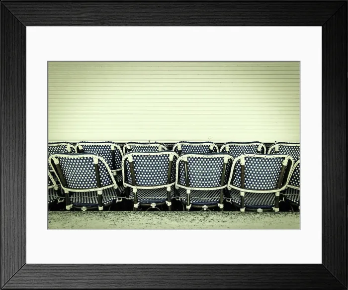 Framed Print : Restaurant chairs lined up