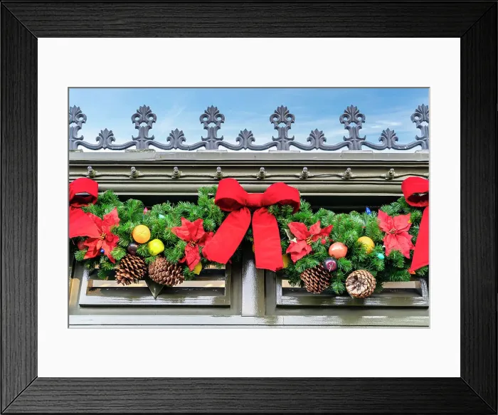 Framed Print : Christmas decoration of red bows and pine cones Framed Print : Christmas decoration of red bows and pine cones