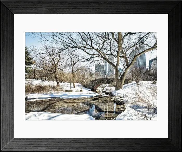 Framed Print : USA, New York City, Manhattan Central Park, Gapstow bridge in winter with snow, skyscrapers