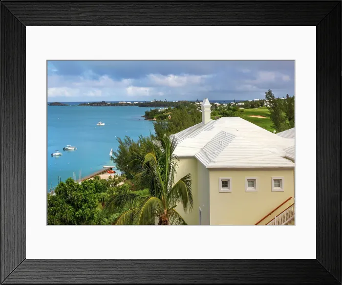 Framed Print : Bermuda, view of Castle Harbor waterfront with cerulean ocean and iconic white rooftop Framed Print : Bermuda, view of Castle Harbor waterfront with cerulean ocean and iconic white rooftop