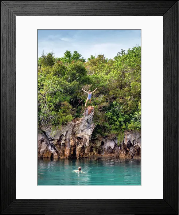 Framed Print : Bermuda, Blue Hole Park, Woman jumping into aquamarine swimming hole Framed Print : Bermuda, Blue Hole Park, Woman jumping into aquamarine swimming hole