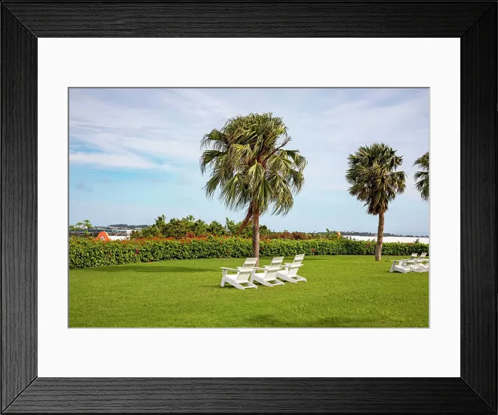 Framed Print : Bermuda, Outdoor chairs on green lawn at Grotto Bay Beach Resort & Spa Framed Print : Bermuda, Outdoor chairs on green lawn at Grotto Bay Beach Resort & Spa