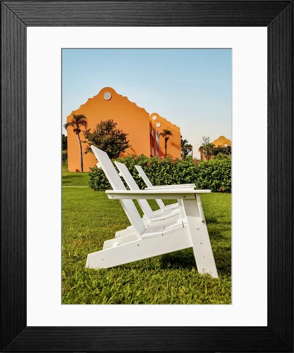 Framed Print : Bermuda, Outdoor chairs on green lawn at Grotto Bay Beach Resort & Spa Framed Print : Bermuda, Outdoor chairs on green lawn at Grotto Bay Beach Resort & Spa