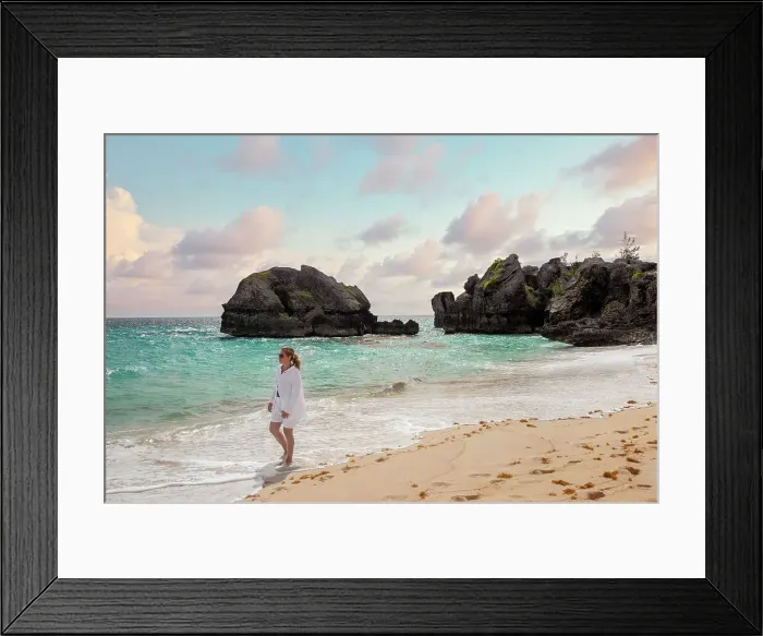 Framed Print : Bermuda, Warwick Long Bay, woman walking on beach with aquamarine water and pink sand Framed Print : Bermuda, Warwick Long Bay, woman walking on beach with aquamarine water and pink sand