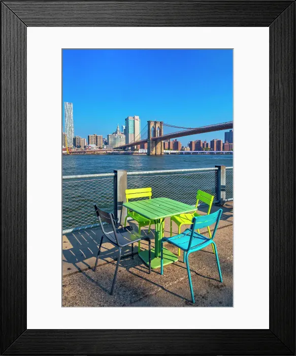 Framed Print : New York City, Brooklyn, Colorful chairs and tables in Brooklyn Bridge Park with view of Manhattan Framed Print : New York City, Brooklyn, Colorful chairs and tables in Brooklyn Bridge Park with view of Manhattan