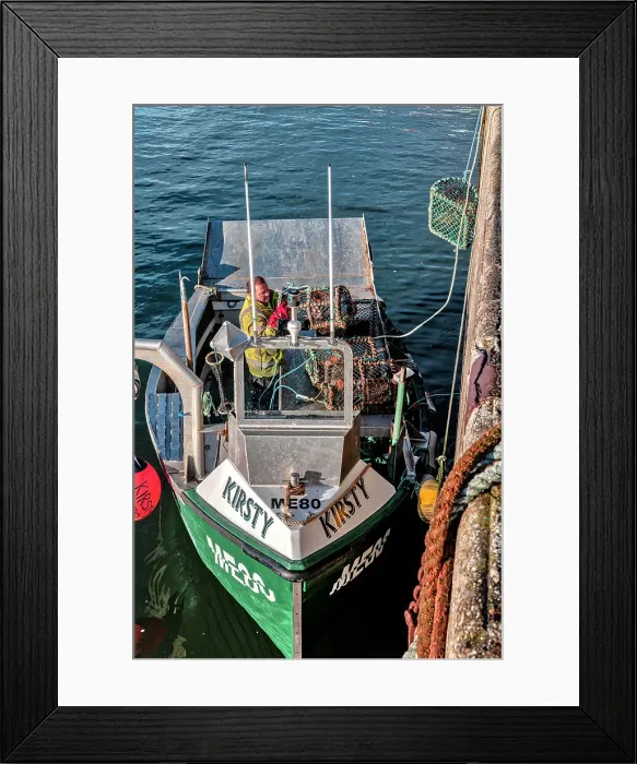 Framed Print : Scotland, Highlands, Balintore, Lobster Fishermen loading boat with traps