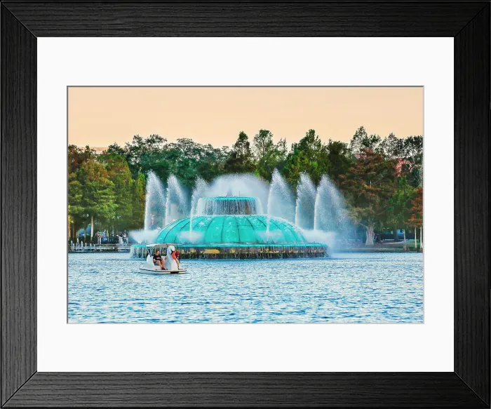 Framed Print : Florida, Orlando, Lake Eola Park, Fountain and Swan paddle boat
