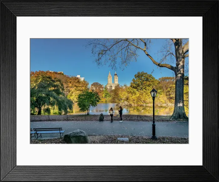 Framed Print : NY, NYC, Central Park, path along lake, San Remo apartments in background Framed Print : NY, NYC, Central Park, path along lake, San Remo apartments in background
