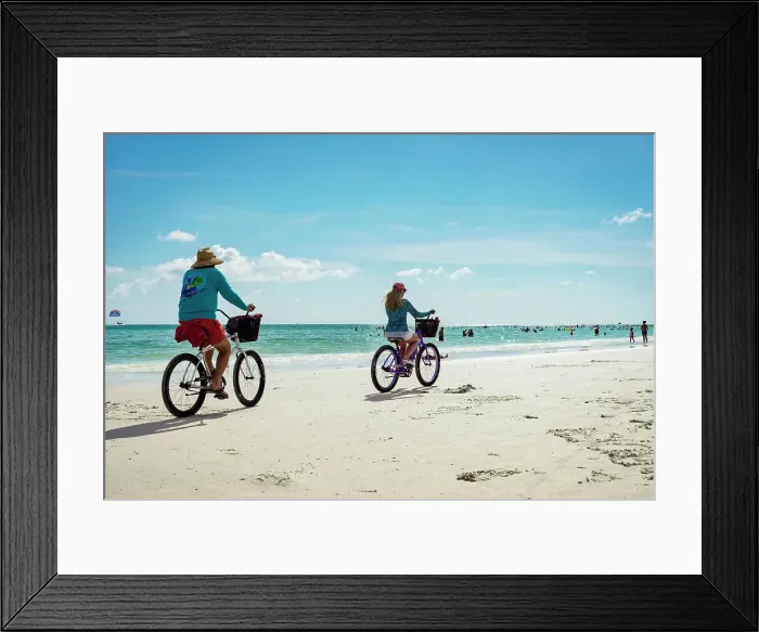 Framed Print : Florida, Sarasota, Siesta Key, Couple Bike riding on beach Framed Print : Florida, Sarasota, Siesta Key, Couple Bike riding on beach