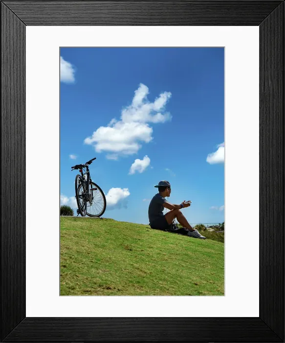 Framed Print : Florida, Miami Beach, South Pointe Beach Park, biker taking a break Framed Print : Florida, Miami Beach, South Pointe Beach Park, biker taking a break