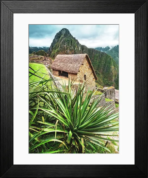 Framed Print : Peru, Machu Picchu ruins, reconstructed hut and Huayna Picchu mountain