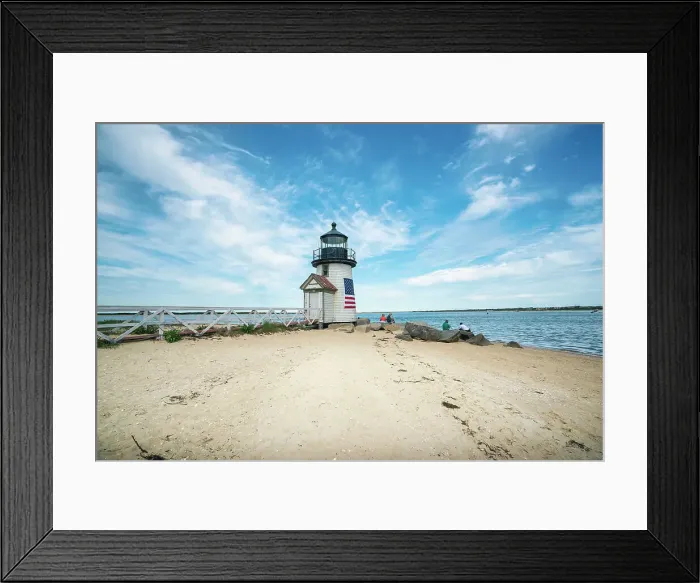 Framed Print : USA, Nantucket, Massachusetts, Brant Point Lighthouse, people seated on rocks Framed Print : USA, Nantucket, Massachusetts, Brant Point Lighthouse, people seated on rocks