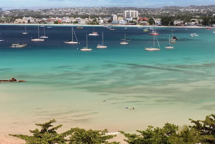 Framed Print : Barbados, Pebbles Beach, with Bridgetown in background Framed Print : Barbados, Pebbles Beach, with Bridgetown in background