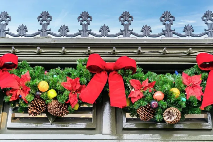 Framed Print : Christmas decoration of red bows and pine cones Framed Print : Christmas decoration of red bows and pine cones