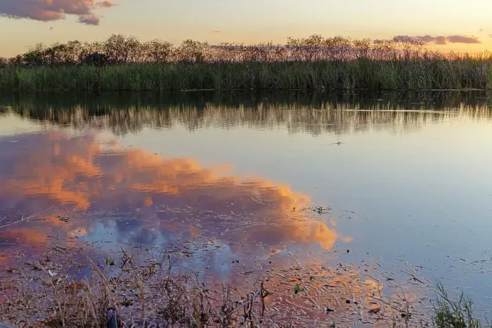 Framed Print : Clouds reflecting over water at sunset Framed Print : Clouds reflecting over water at sunset
