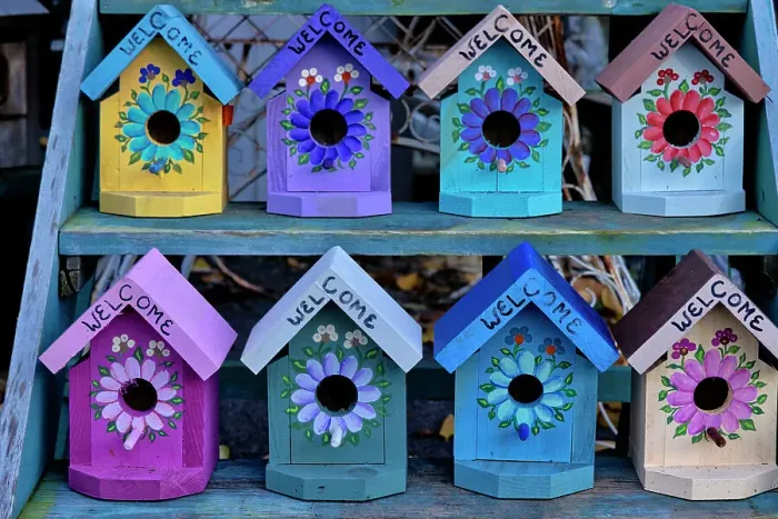 Framed Print : Display of Colorful Bird houses for sale Framed Print : Display of Colorful Bird houses for sale