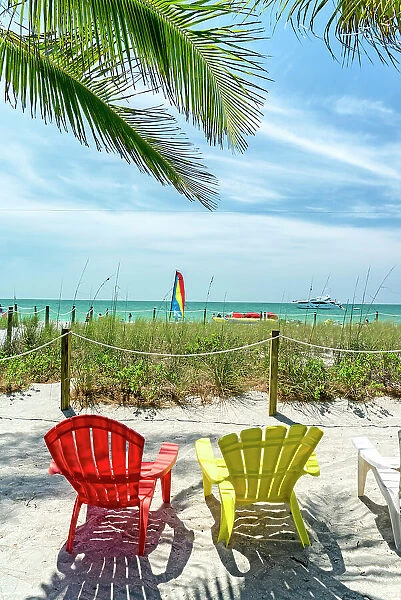 Florida, Captiva Island, colorful deck chairs by the beach