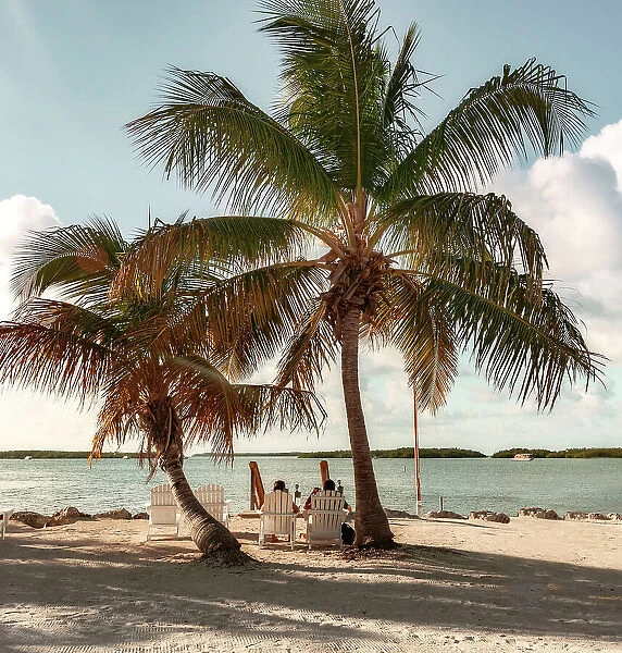 Florida, Islamorada, couple relaxing by the beach