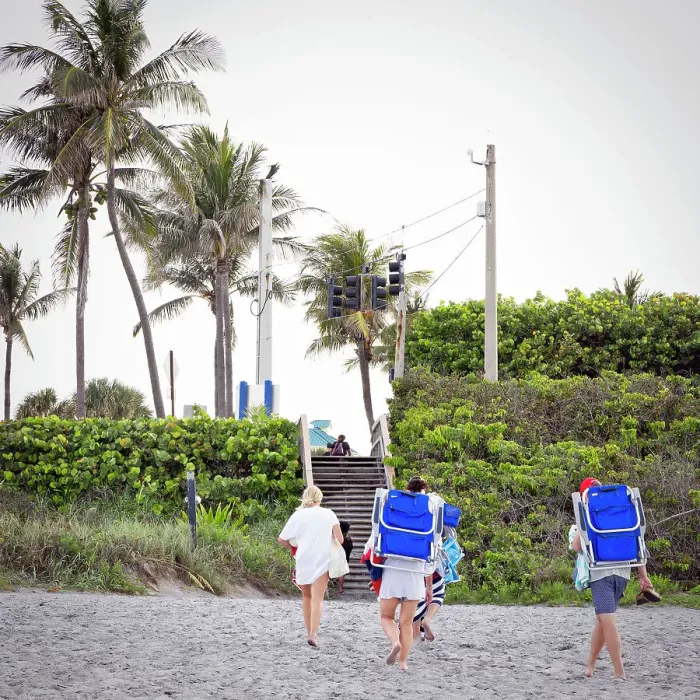 Framed Print : Florida, Juno Beach, people walking with beach chairs Framed Print : Florida, Juno Beach, people walking with beach chairs