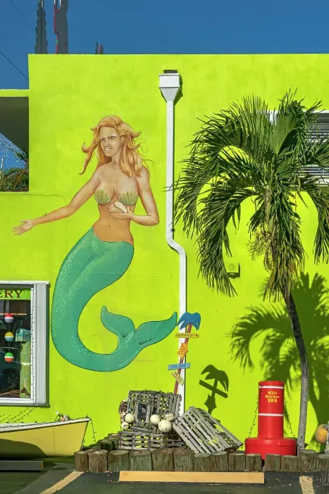 Framed Print : Florida, The Keys, Islamorada, mermaid mural near palm tree Framed Print : Florida, The Keys, Islamorada, mermaid mural near palm tree