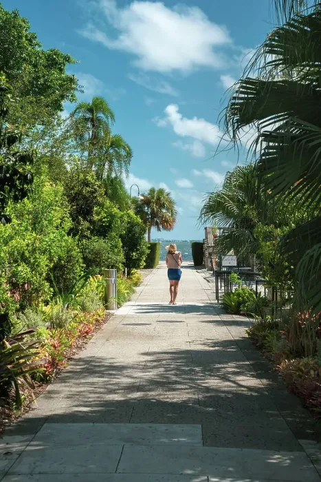 Framed Print : Florida, Miami, Villa Vizcaya, woman walking towards water