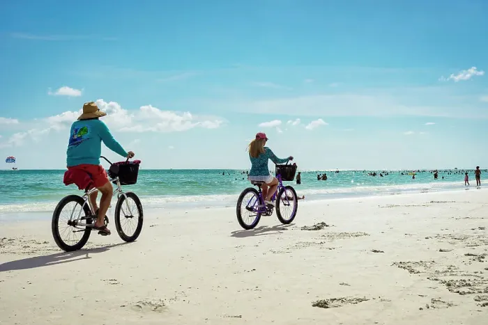 Framed Print : Florida, Sarasota, Siesta Key, Couple Bike riding on beach Framed Print : Florida, Sarasota, Siesta Key, Couple Bike riding on beach