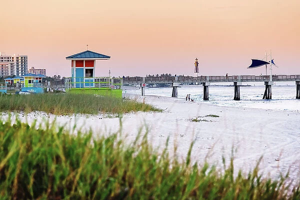 Florida, South Florida, Boynton Beach pier at dusk, Hillsboro lighthouse in background