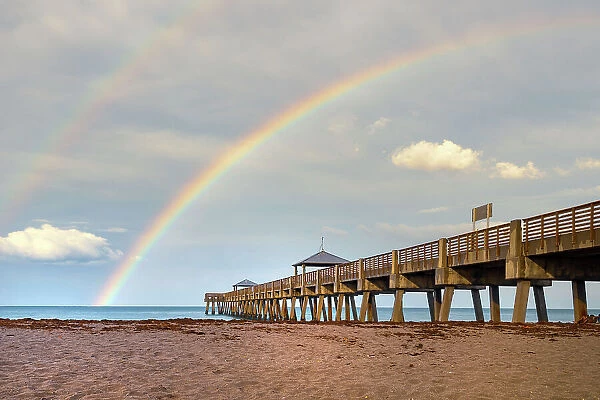 Florida, South Florida, rainbow over Juno Beach pier