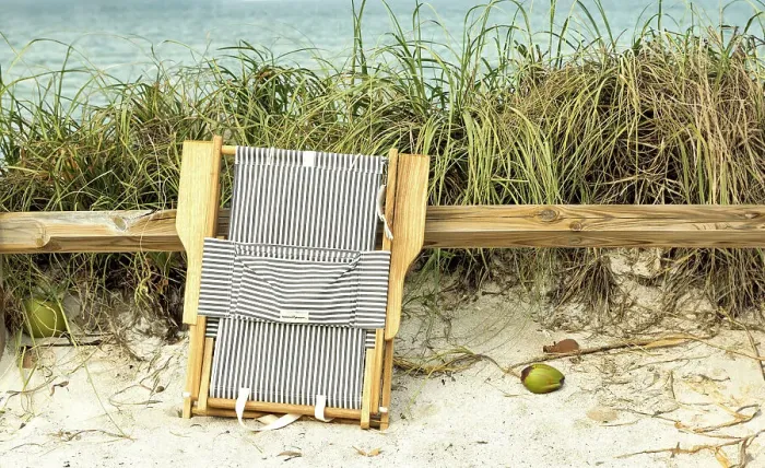 Framed Print : Folded beach chair