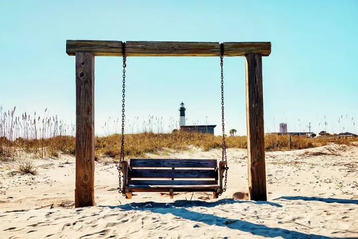 Framed Print : Georgia, Tybee Island, North Beach, wooden swing, Tybee lighthouse in background Framed Print : Georgia, Tybee Island, North Beach, wooden swing, Tybee lighthouse in background