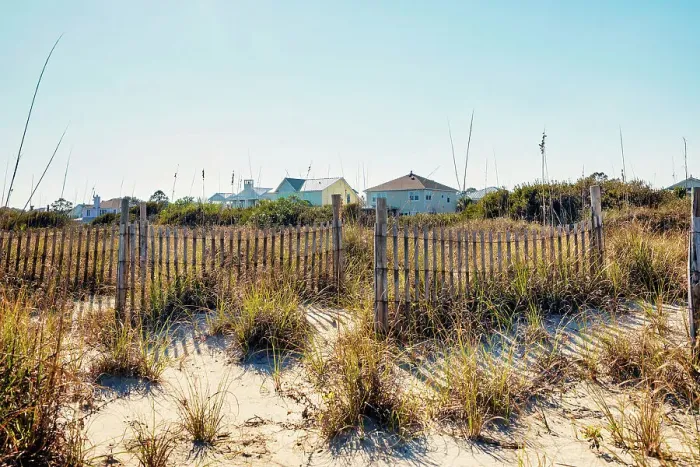 Framed Print : Georgia, Tybee Island, waterfront homes wooden fence and sand dunes Framed Print : Georgia, Tybee Island, waterfront homes wooden fence and sand dunes