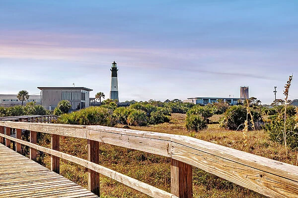Georgia, Tybee Island, wooden beach path and Tybee Lighthouse
