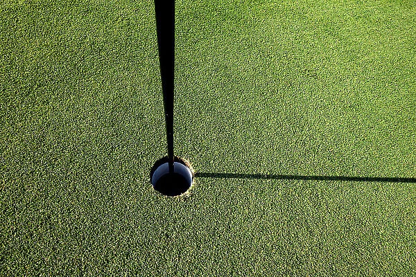 Golf ball hole
