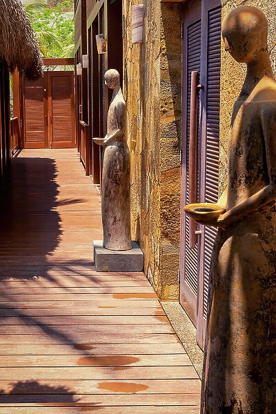 Hallway with human like sculptures