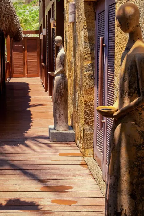 Framed Print : Hallway with human like sculptures Framed Print : Hallway with human like sculptures