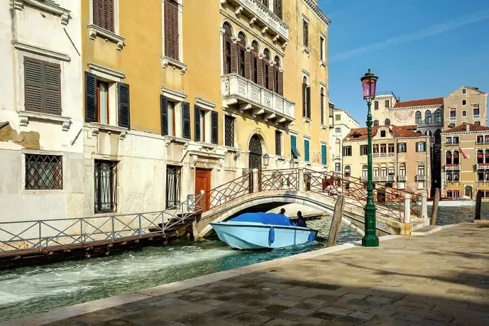 Framed Print : Italy, Veneto, Venice, Motor boat passing under bridge on canal Framed Print : Italy, Veneto, Venice, Motor boat passing under bridge on canal