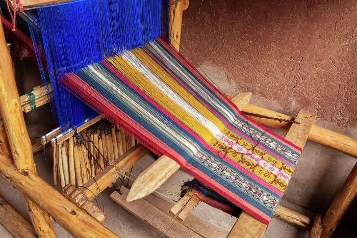 Framed Print : Peru, Sacred valley, detail of looming machine processing alpaca wool