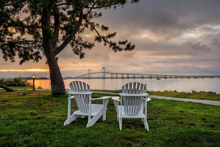 Framed Print : Rhode Island, Newport, adirondack chairs facing Claiborne Pell Bridge over Narragansett Bay