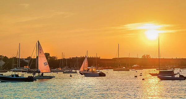 Rhode Island, Newport, sailboats on Narragansett Bay at sunset